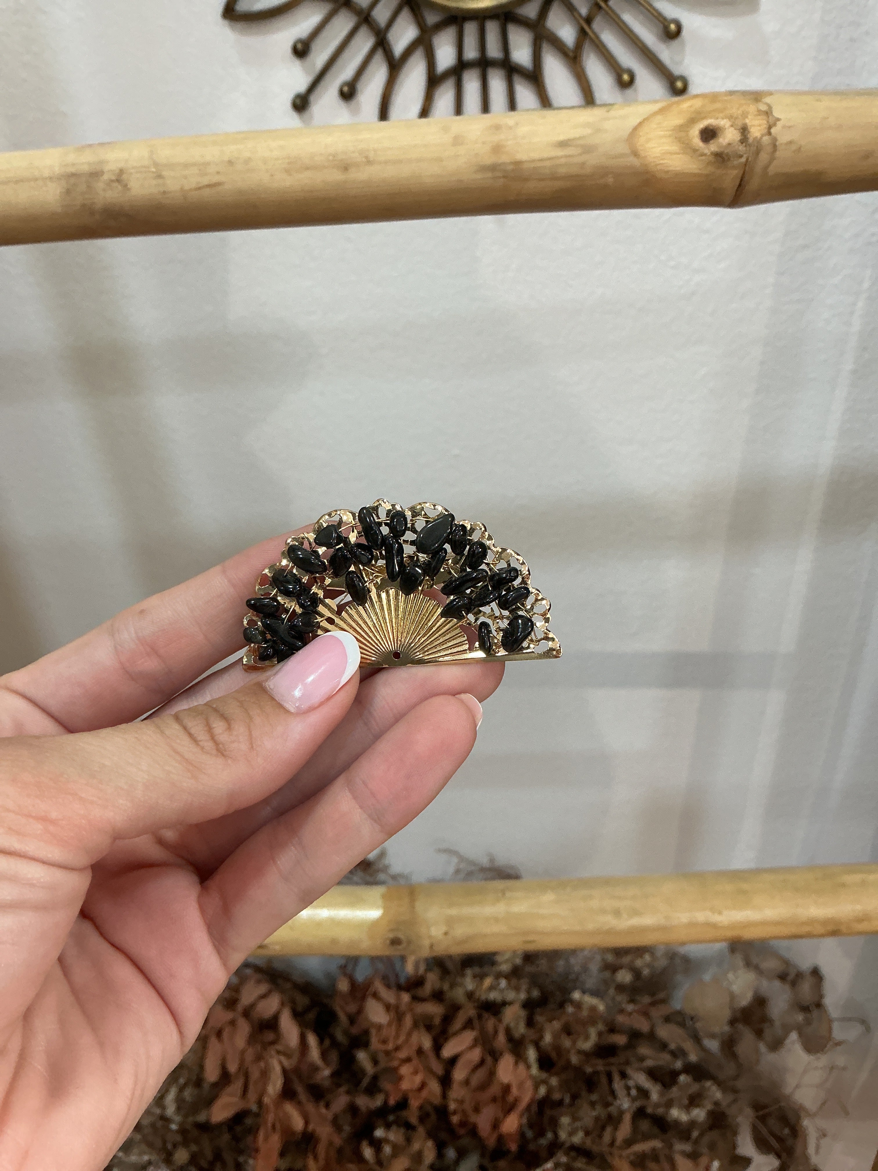 Broche f abanico piedras