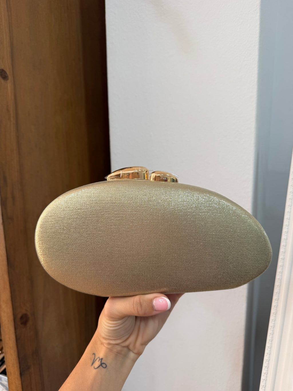 Cartera ovalada