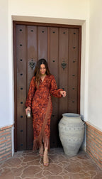 Vestido estampado flecos