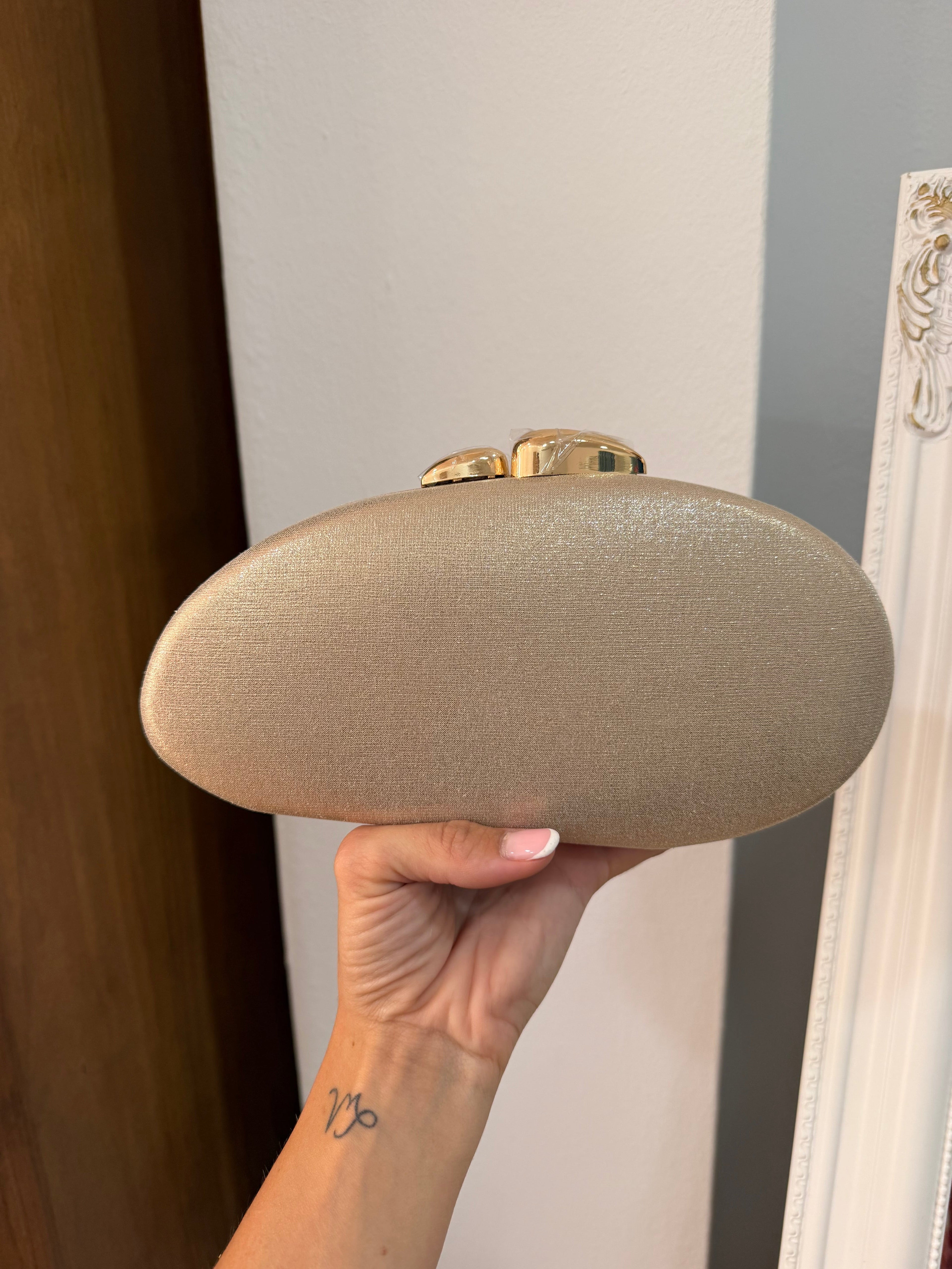 Cartera ovalada