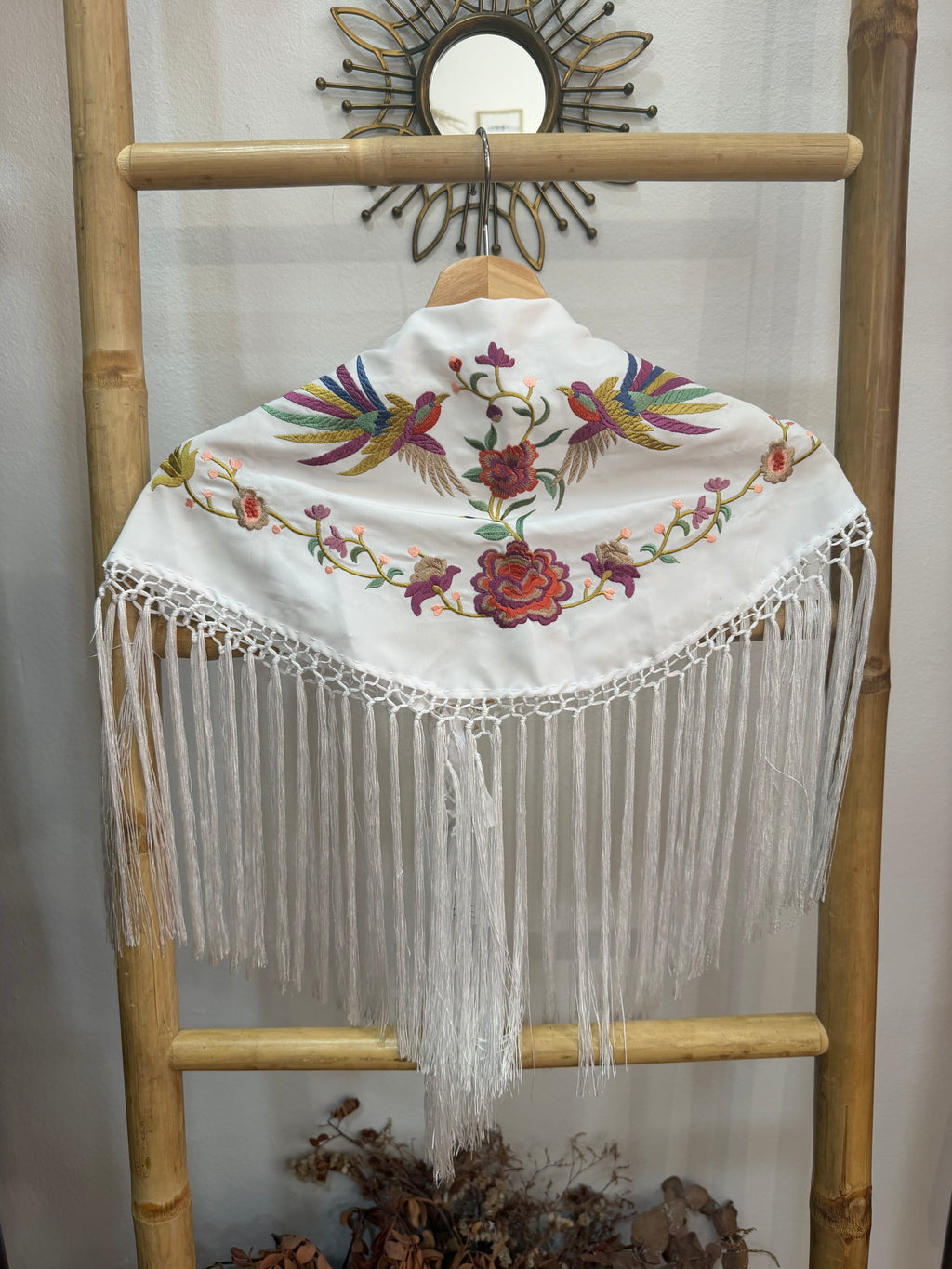Manton pajaro niña