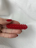 Broche f piedras