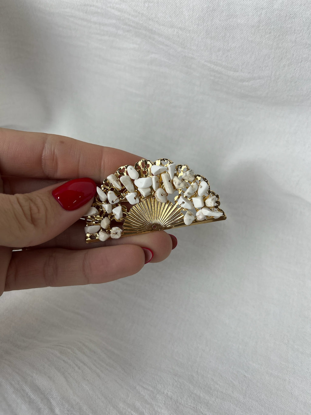 Broche f abanico piedras