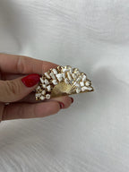 Broche f abanico piedras