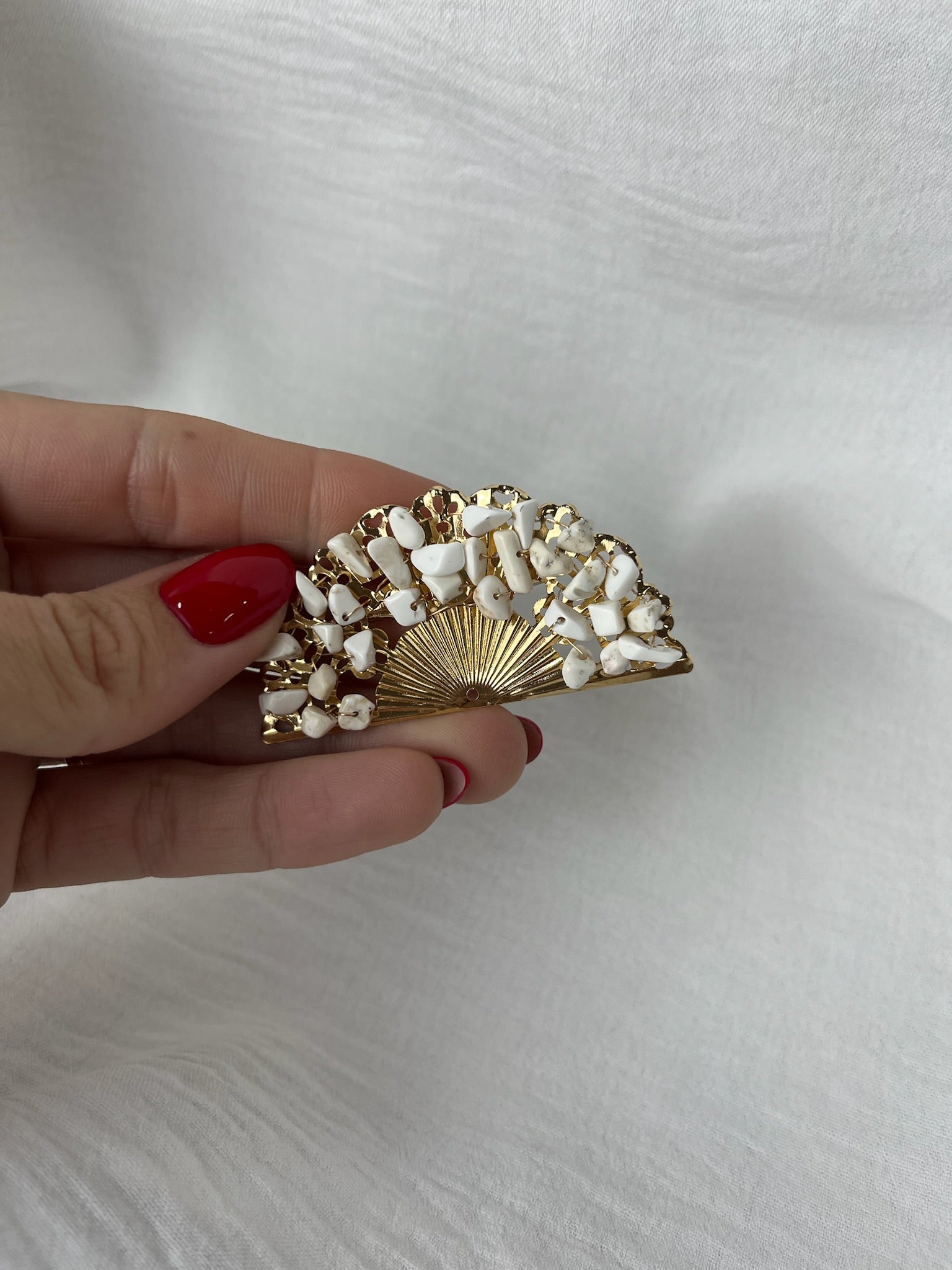Broche f abanico piedras