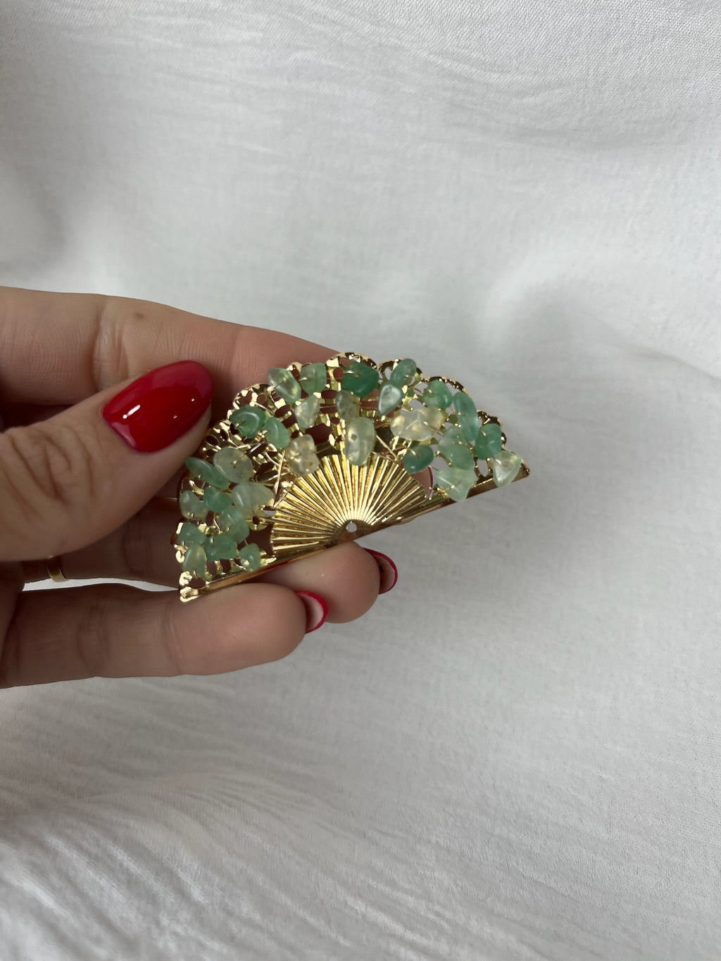 Broche f abanico piedras