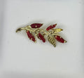 Broche f corales