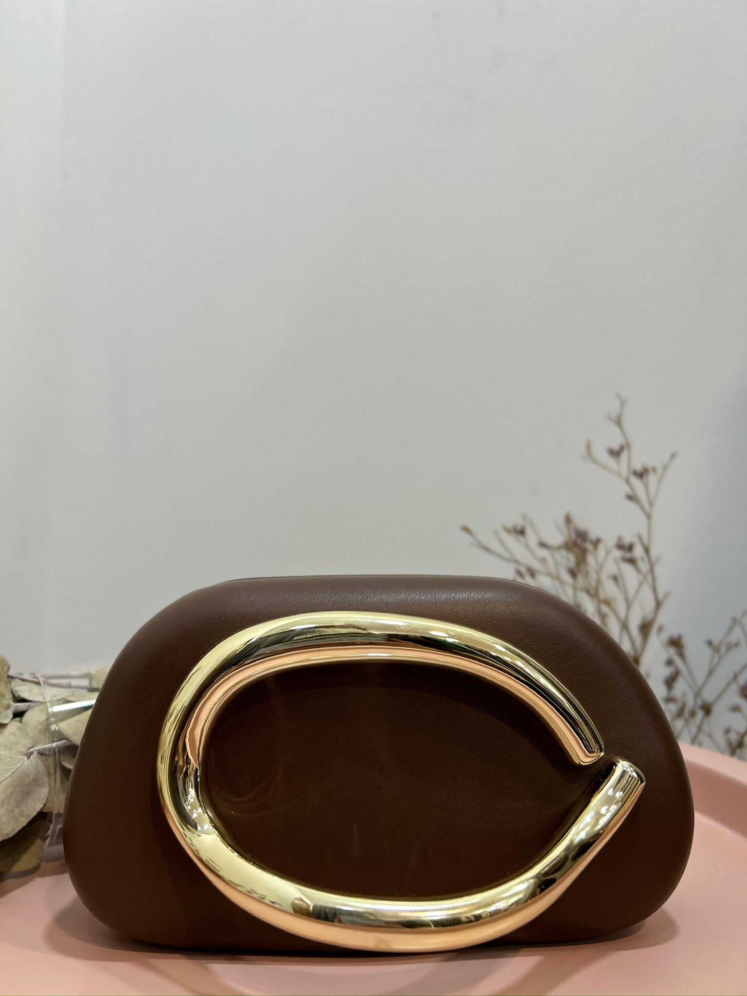 Cartera detalle dorado