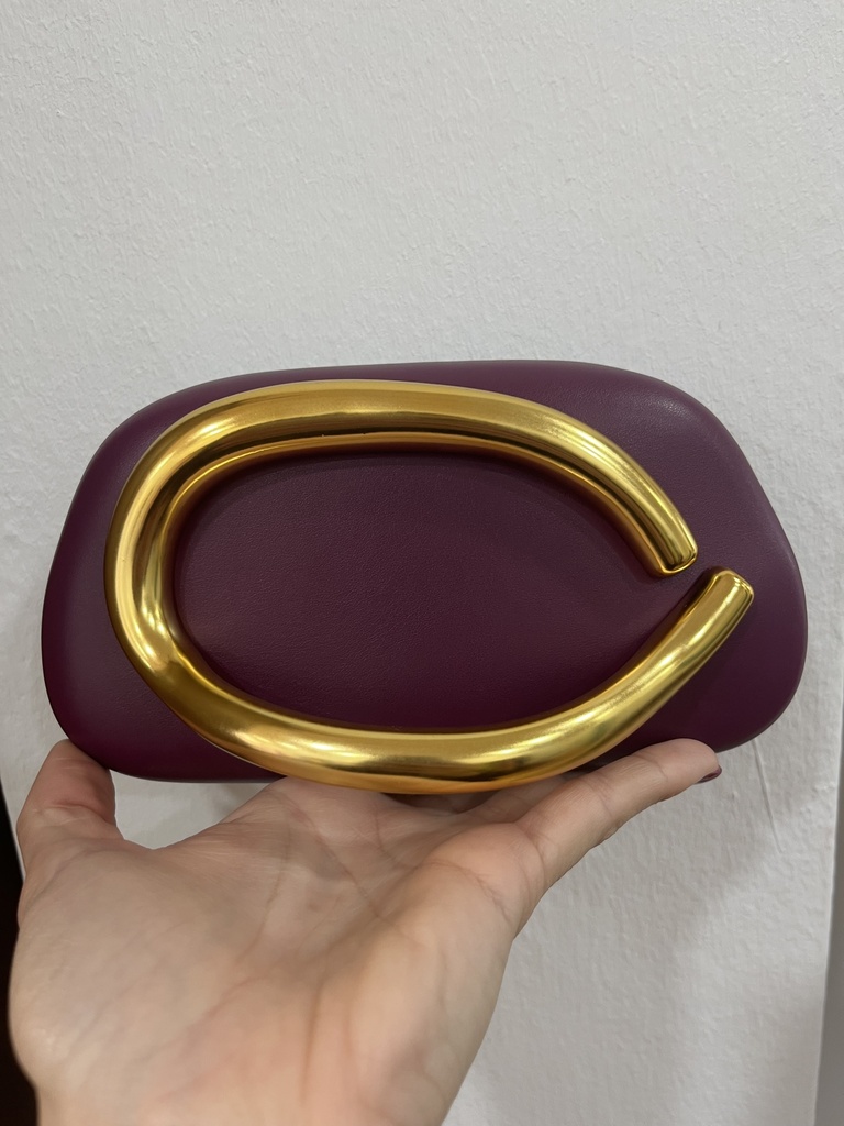 [250475berengena] Cluch dorado (Berengena)