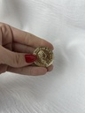 broche  moneda